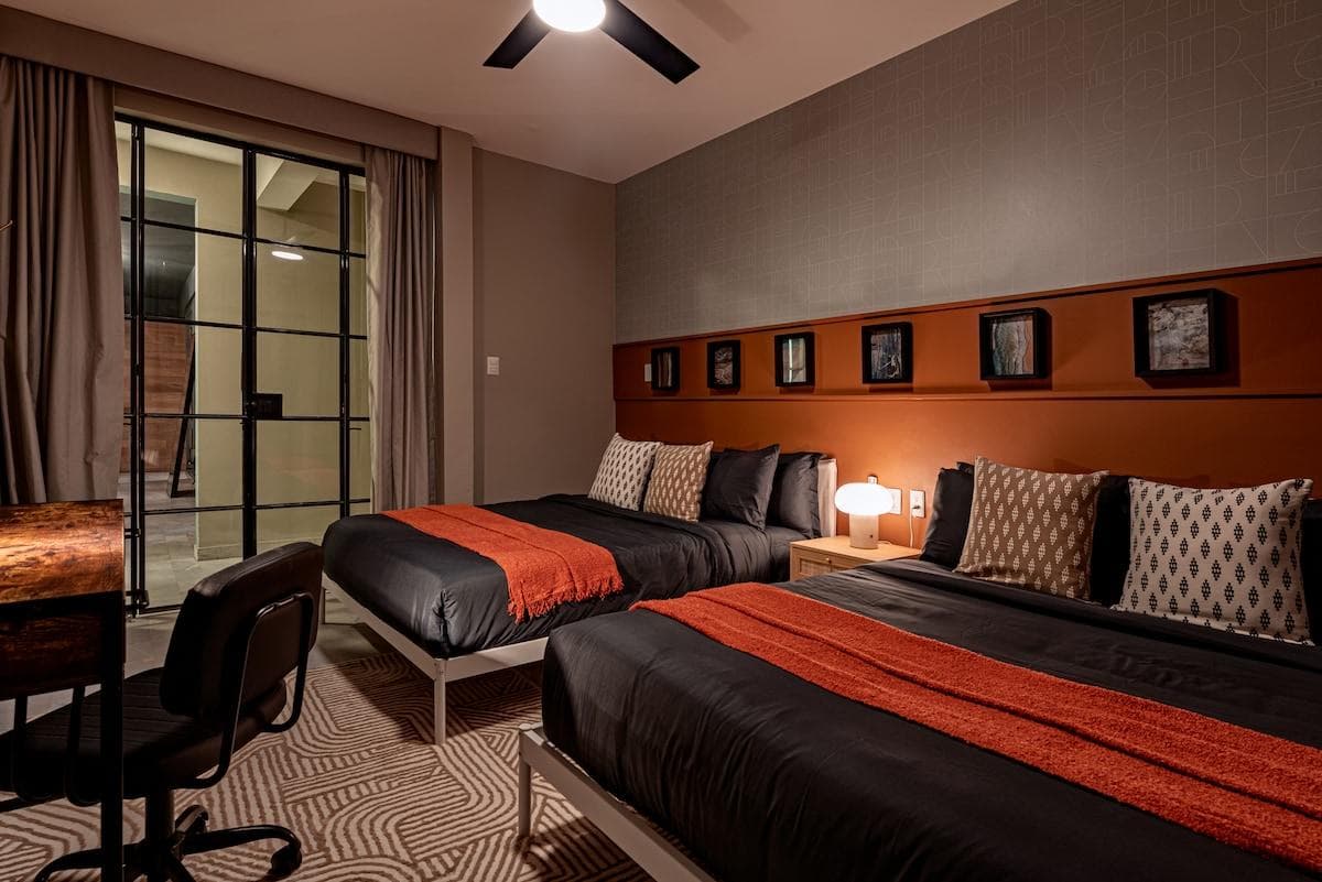 Bedroom with bold colors and sophisticated design for a relaxing stay