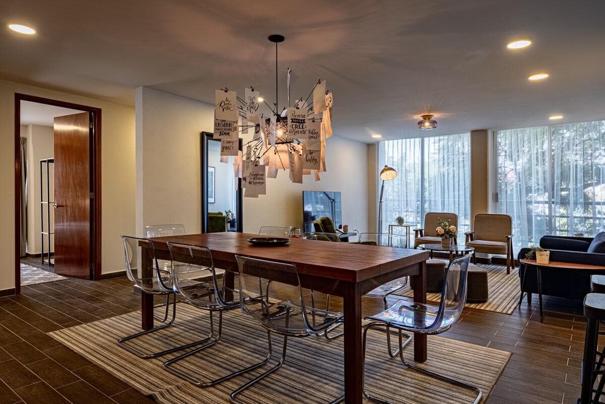 Minimalist, chic dining area, great for cozy meals with a view.