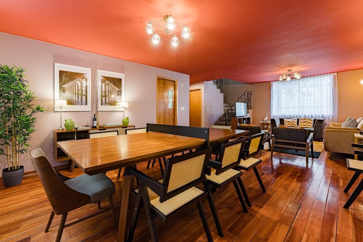 Expansive dining area with a large table for family meals or group gatherings.