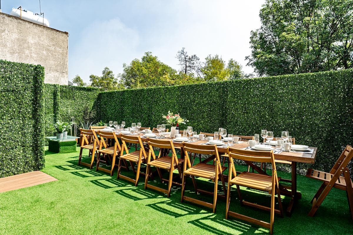Outdoor dining space on the rooftop, perfect for group meals