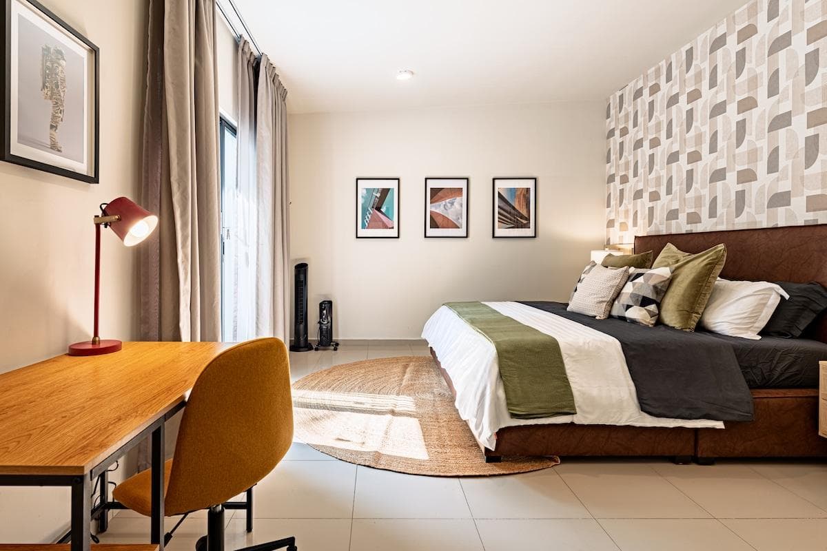 Bedroom with dedicated workspace and modern furnishings