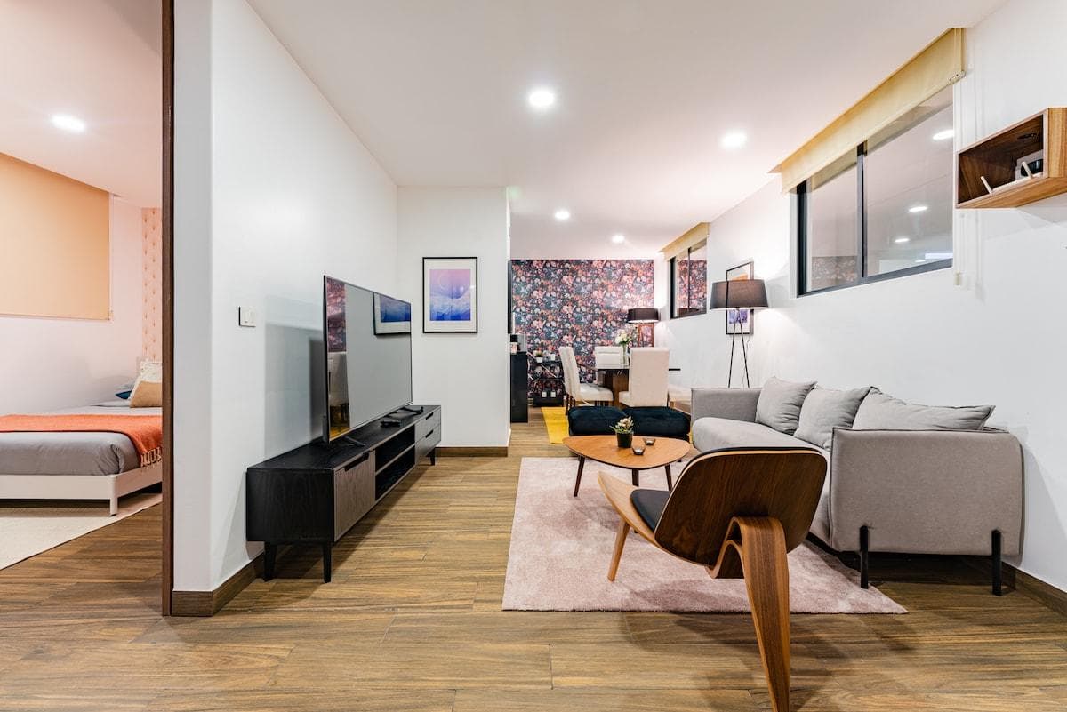 Open layout connecting the living room to the dining and kitchen areas