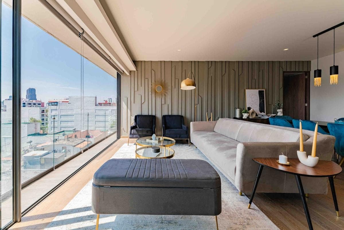 Spacious living area with beautiful cityscape backdrop.