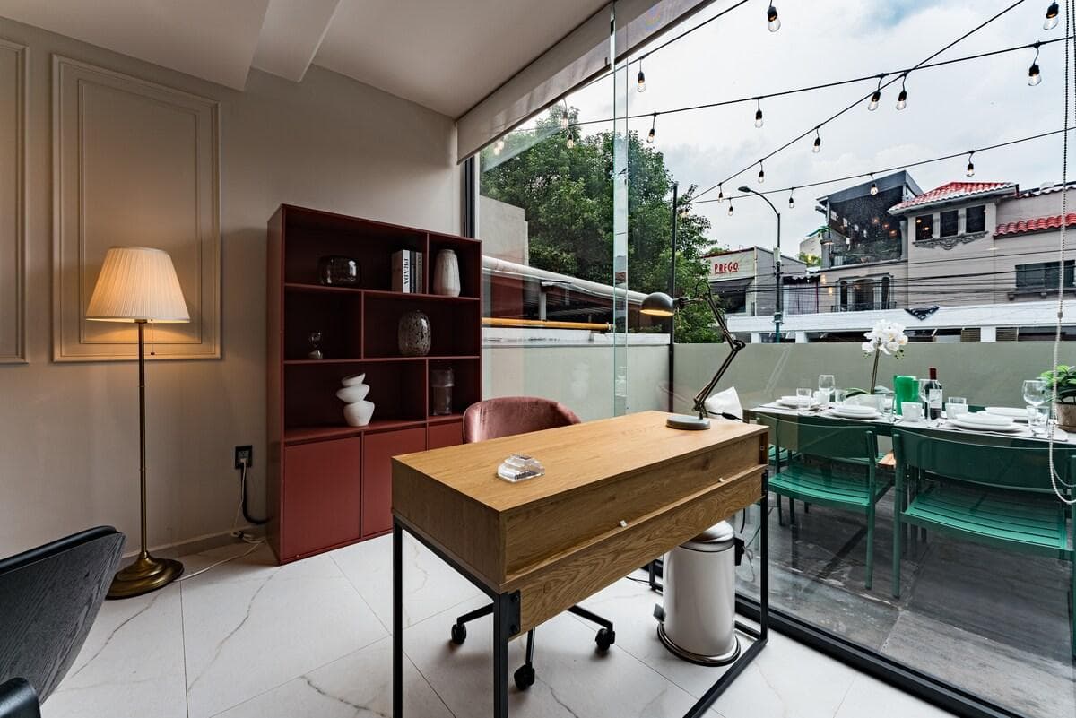 Dedicated home office area with a large window for an inspiring view while working.