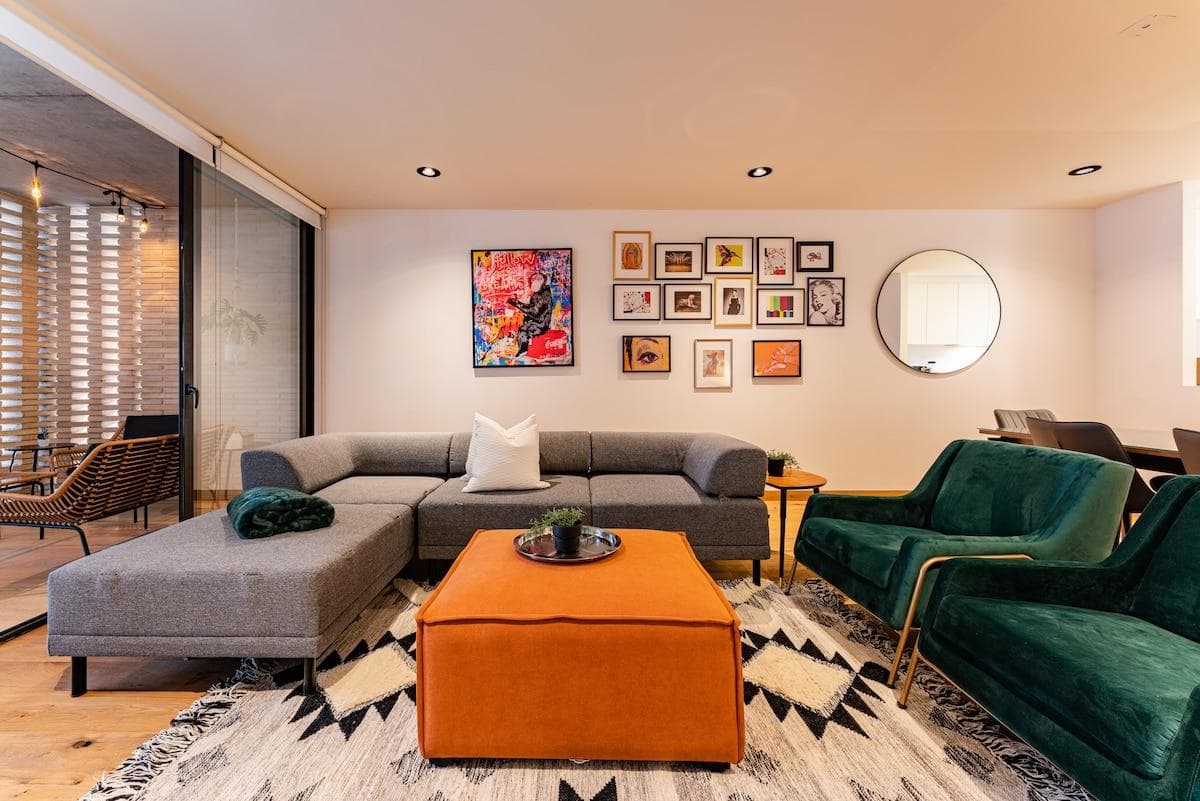 Cozy seating in the living room, ideal for unwinding with a book or movie.