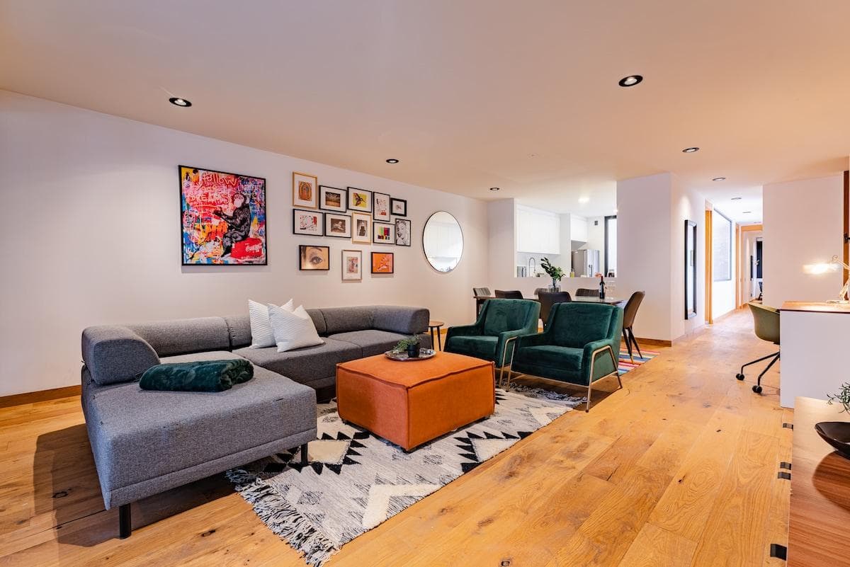 Spacious living area with modern decor, perfect for gatherings.