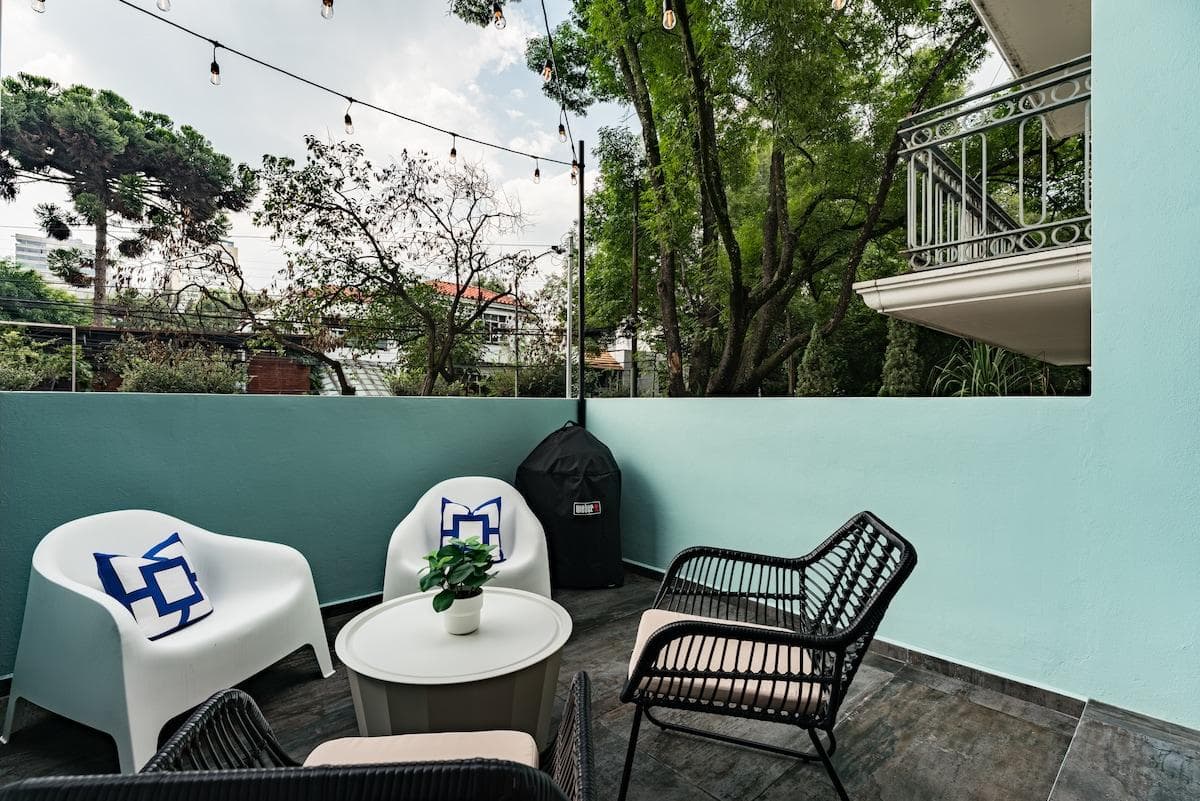 Private outdoor space with lush greenery, perfect for morning coffee