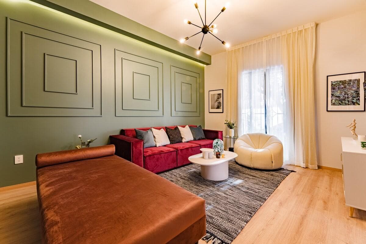 Elegant living room with vibrant decor, perfect for group gatherings.