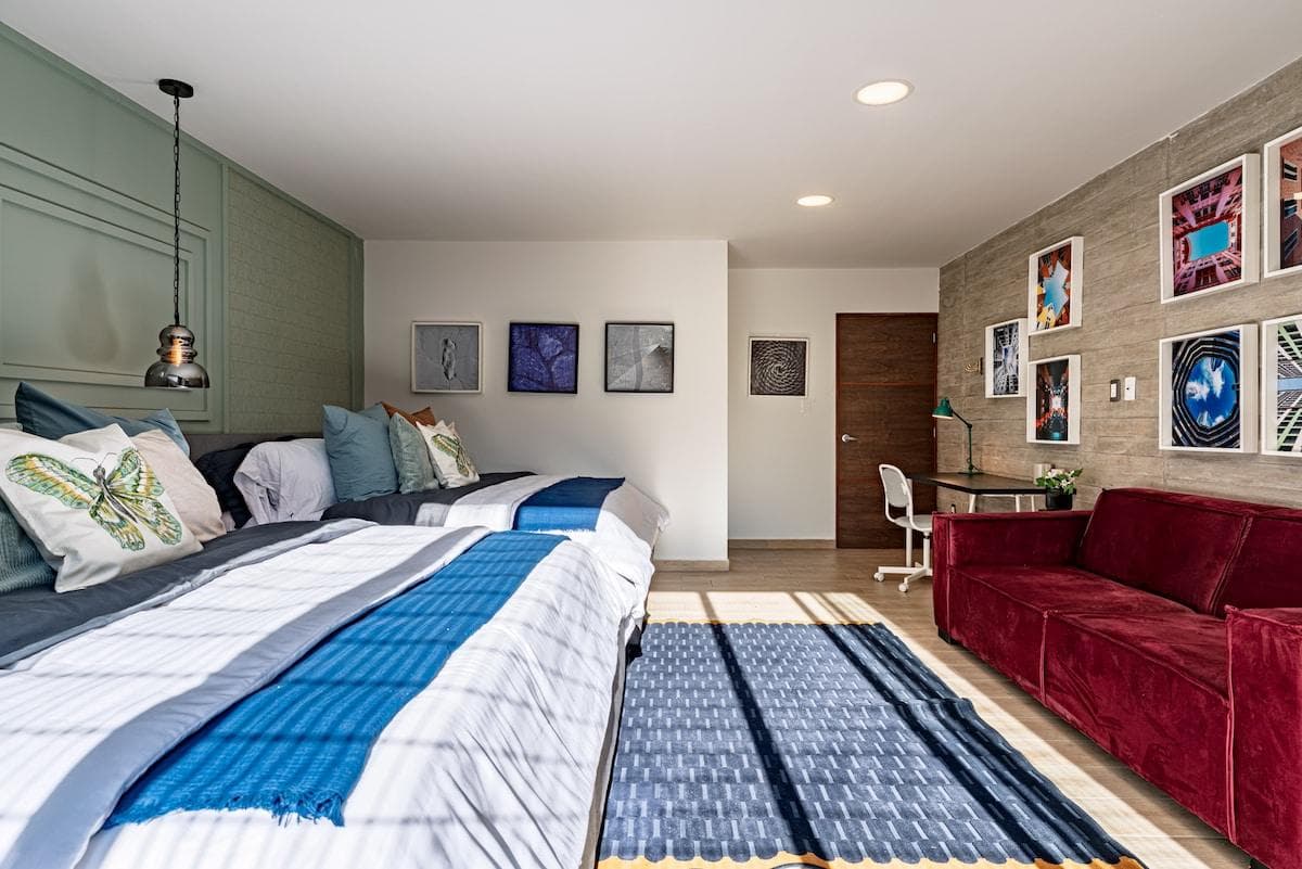 Spacious bedroom with ample natural light, making it a peaceful retreat